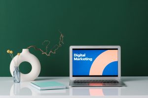 Text 'Digital Marketing' in a laptop screen