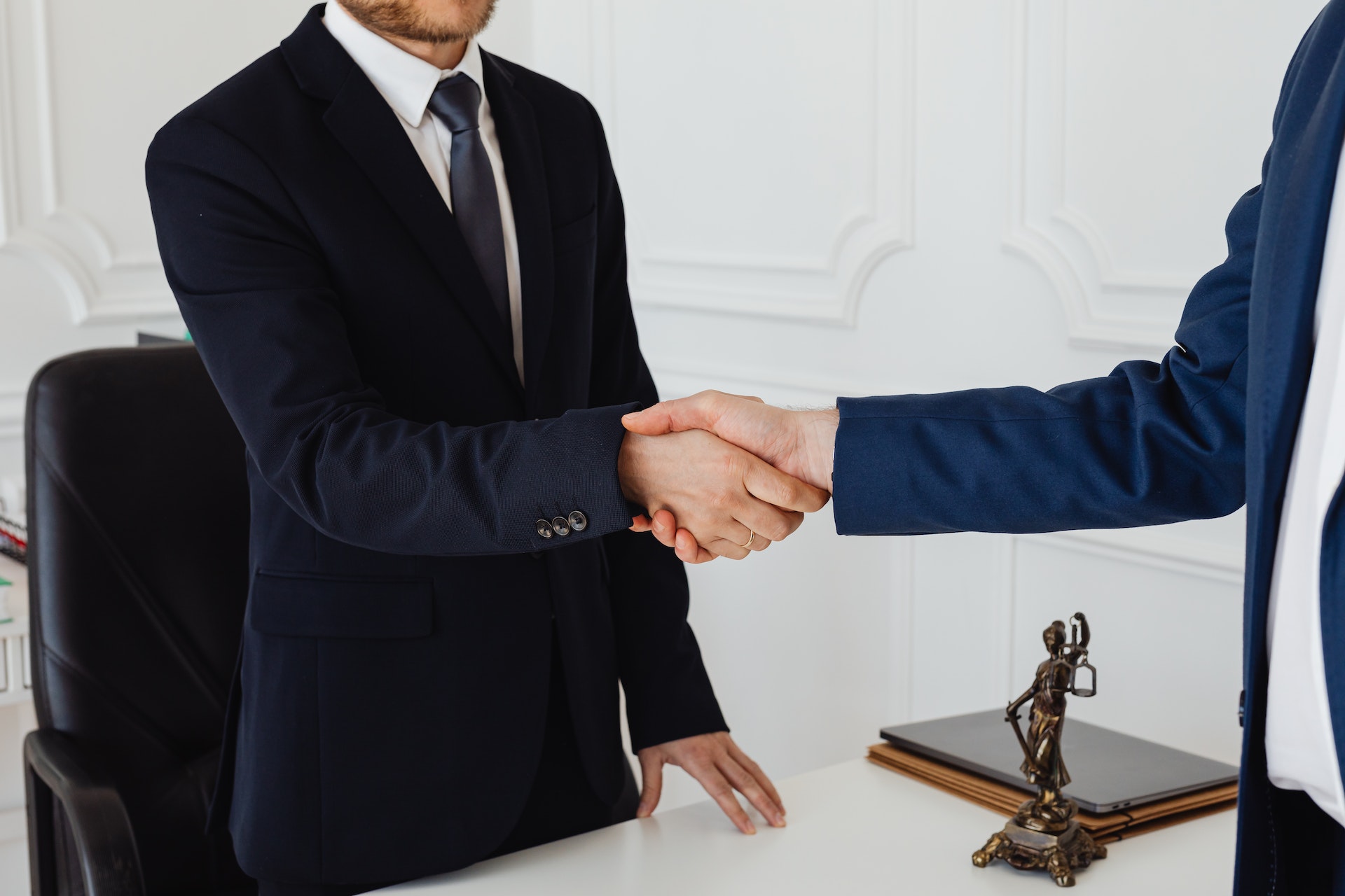 Lawyer shaking hands with a client