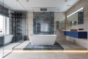 Stone bathroom having beautiful interior with freestanding tub